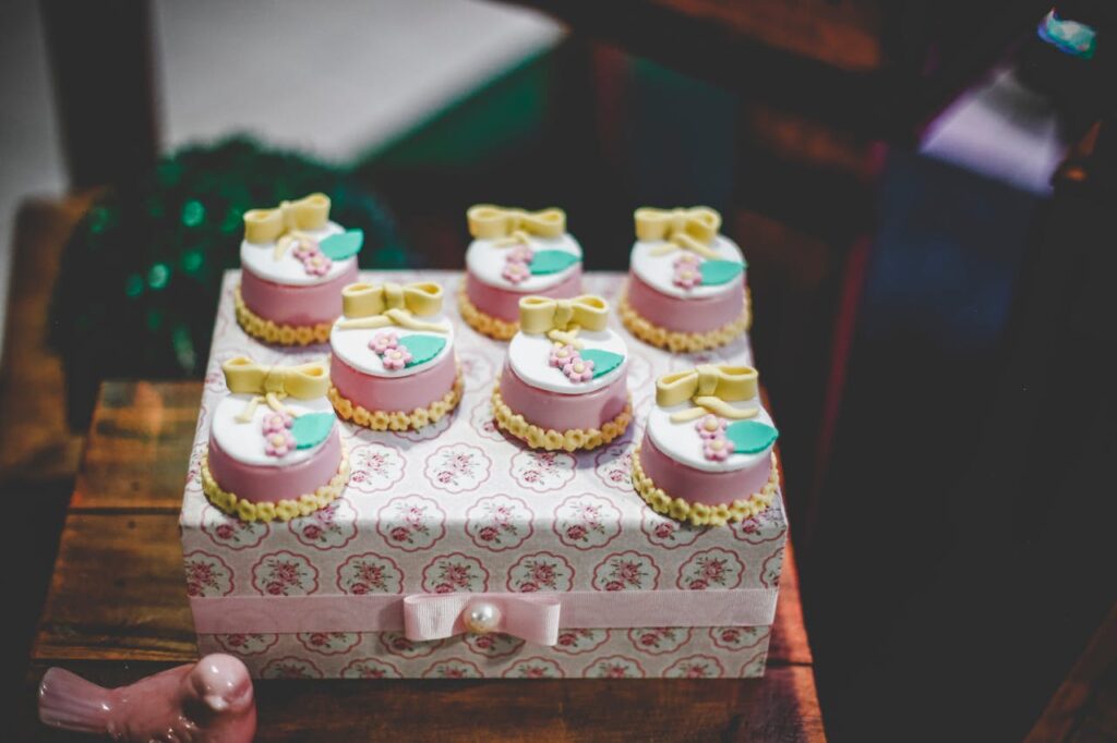 Beautifully decorated mini cakes with floral designs, perfect for elegant occasions.